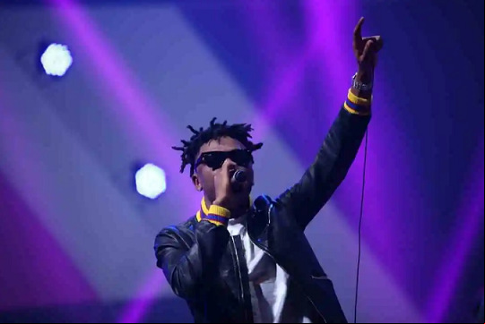 Picture of Mayorkun Performing on Stage
